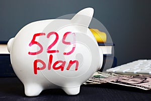 529 plan written on a piggy bank. College savings plan.