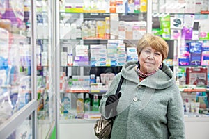 55-year-old woman buys cold medicine in  spring day