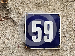 59 on vintage house plate