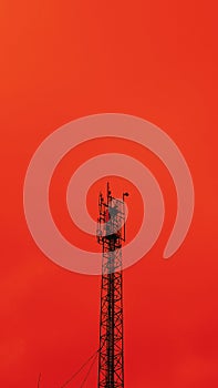 5g network antenna tower. Fast speed connection. Red toned. Bottom view.