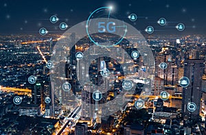 5G network on city background. The wireless communication technology network links work in many branches in smart cities