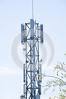 5G Network Connection Concept-5G smart cellular network antenna base station on the telecommunication mast. at a blue