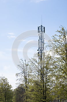 5G Network Connection Concept-5G smart cellular network antenna base station on the telecommunication mast. In a green environment