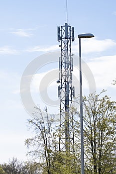 5G Network Connection Concept-5G smart cellular network antenna base station on the telecommunication mast. In a green environment