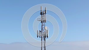 5G network tower on a blue sky background. cell phone 4G 6G