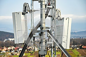 5G new radio telecommunication network antenna mounted on a metal pole providing strong signal waves