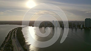 5k aerial sunset in Miami Key Biscayne water and Brickell highrise condos