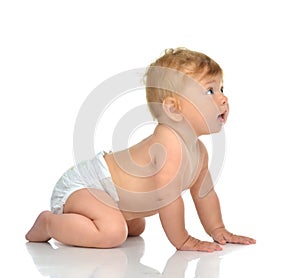 6 month infant child baby toddler sitting or crawling looking at