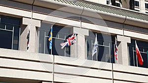 6 National Flags Wave in Winds on Large Hotel Awning San Jose California
