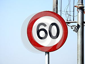 60 KM Speed limit sign a highway, sixty kilometers per hour traffic road sign, a restriction sign for car drivers