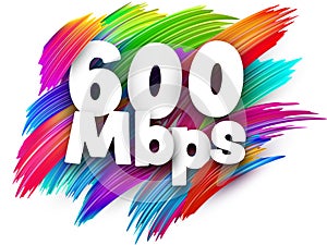 600 Mbps paper word sign with colorful spectrum paint brush strokes over white