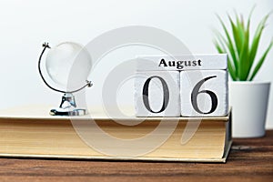 6st august - sixth day month calendar concept on wooden blocks