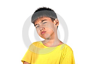 7 or 8 years old kid in serious and cool face expression posing as a badass playing the bully isolated on white background wearing