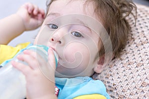 7 month baby milk eating bottle