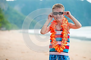 7 year old boy in traditional Hawaiian Lei