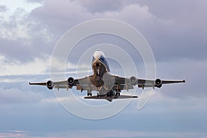 747-400 after takeoff at EMA - stock photo