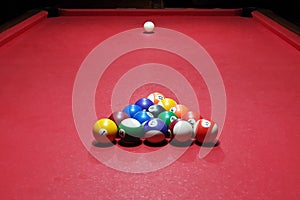 8 Ball Pool balls on red table