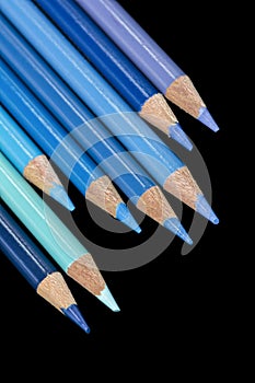 8 Blue Coloured Pencils - Black Background