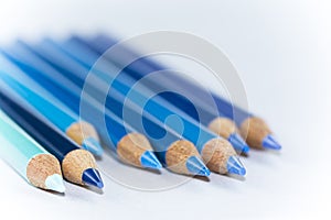 8 Blue Pencils with White Background