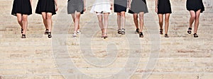 8 girls standing on a stairs, only legs fragment photo; Hen party - bride in white dress an creative photo of sax instrument. Musi