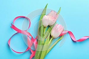 8 March card design with tulips on light blue background, flat lay. International Women`s Day