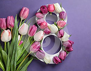 8 March card design with tulips on violet background, flat lay. International Women`s Day