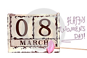 8 March Happy Women`s Day with wooden block calendar and pink lips on a stick, isolated on white