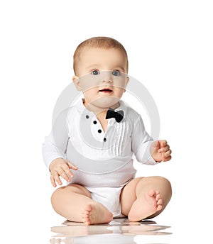 8 month infant child baby boy toddler sitting in white shirt and black tie isolated