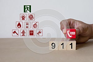 911 Call icons on Wooden blocks concepts.