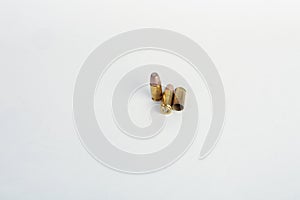 9mm bullet shell casings on white background