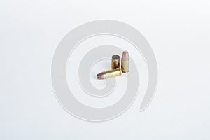 9mm bullet shell casings on white background