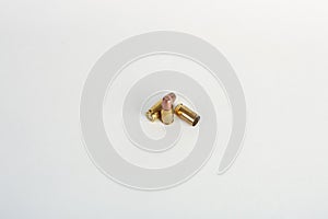 9mm bullet shell casings on white background
