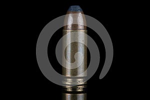 9mm caliber round with reflexion on black with reflexion