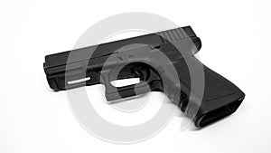 9mm pistol on white background