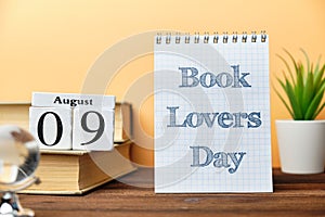 9th august - Book Lovers Day. Ninth day month calendar concept on wooden blocks