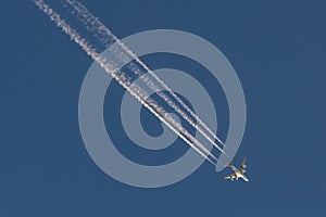 A380 jet airliner streaking across the sky