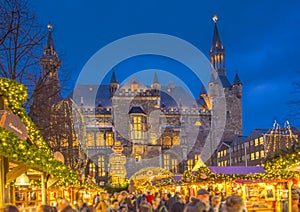 The Aachen town hall and the annual famous Christmas market at night. photo