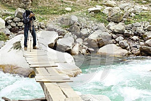 Aadventurous Photographer Aleem on dangerous flooded river swat