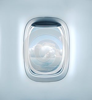 Aairplane window with clouds view