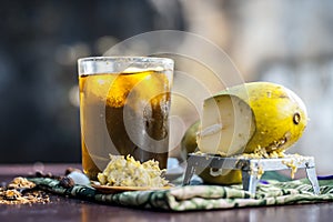 Aam panna shrabat on wooden surface.