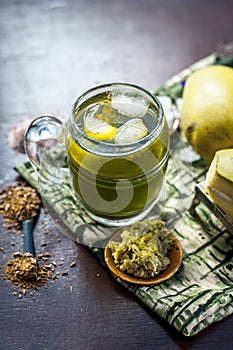 Aam panna shrabat on wooden surface.