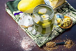 Aam panna shrabat on wooden surface.