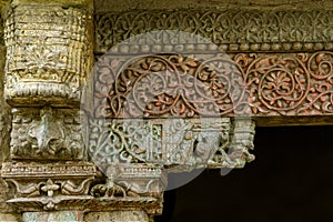 Aancient ornament in the culture of India. Carving wood ancient background.