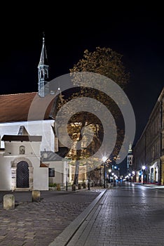 Aancient tenements and church in Krakow, Poland