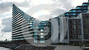 Aarhus , Denmark - 03. 09. 2023: Modern residential area in Denmark taken from a cruise ship. apartment buildings in