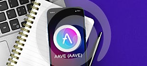 AAVE symbol. Trade with cryptocurrency, digital and virtual money, banking with mobile phone concept. Business workspace