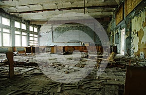 Abadoned school class room at Chernobyl city zone of radioactivity ghost town.