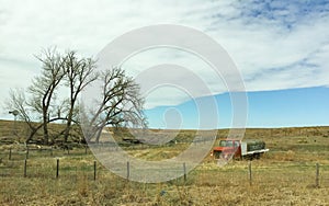 Abadoned Tank Truck in grassy field