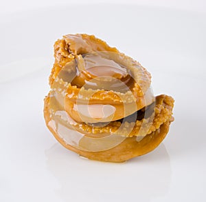 Abalones. Chinese cuisine abalone on background. photo