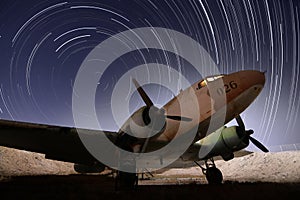 Abandon aircraft and startrails in the background